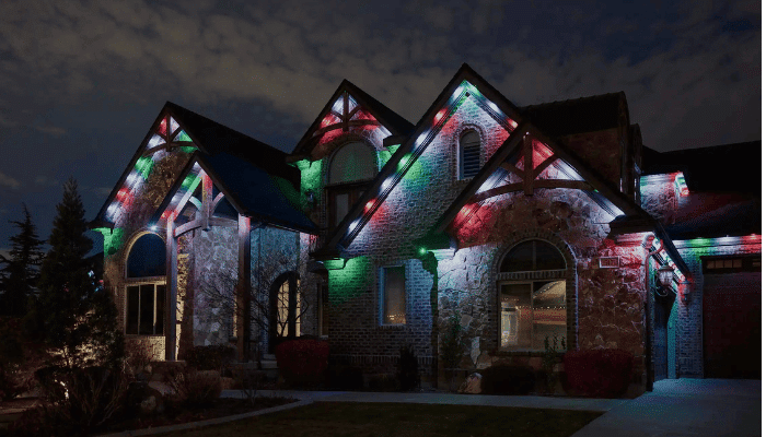 Holiday exterior lighting on a home during winter with increased electrical use